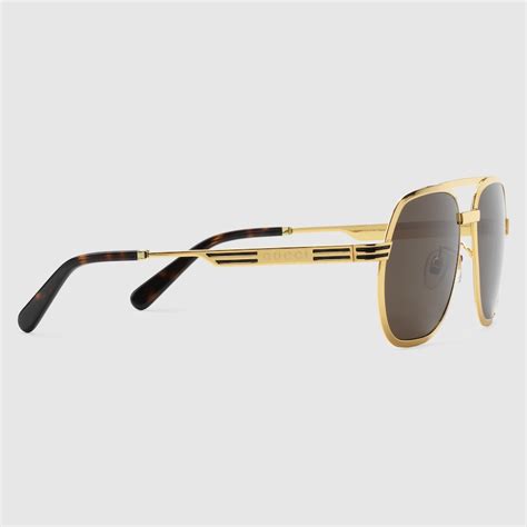 gucci navigator frame|Navigator frame sunglasses in yellow gold metal.